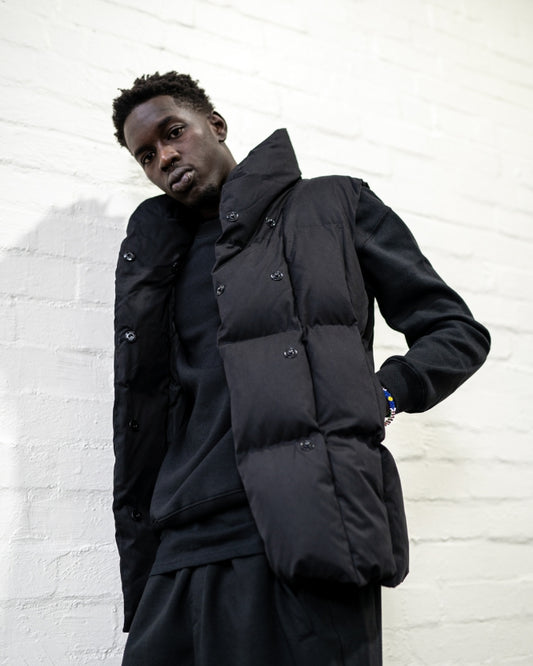 Black Longline Puffer Vest worn by male model
