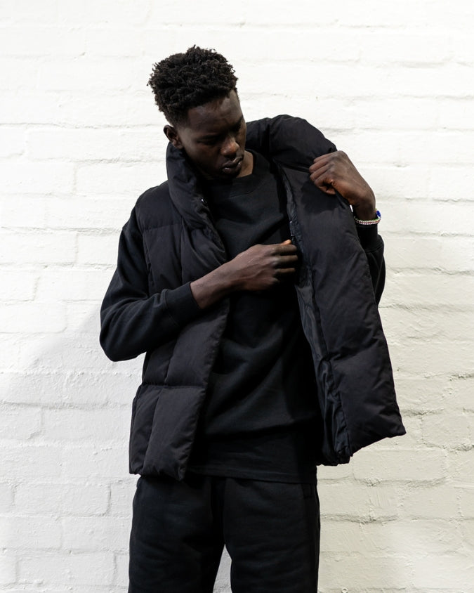 Australian Black Puffer Vest worn by male model