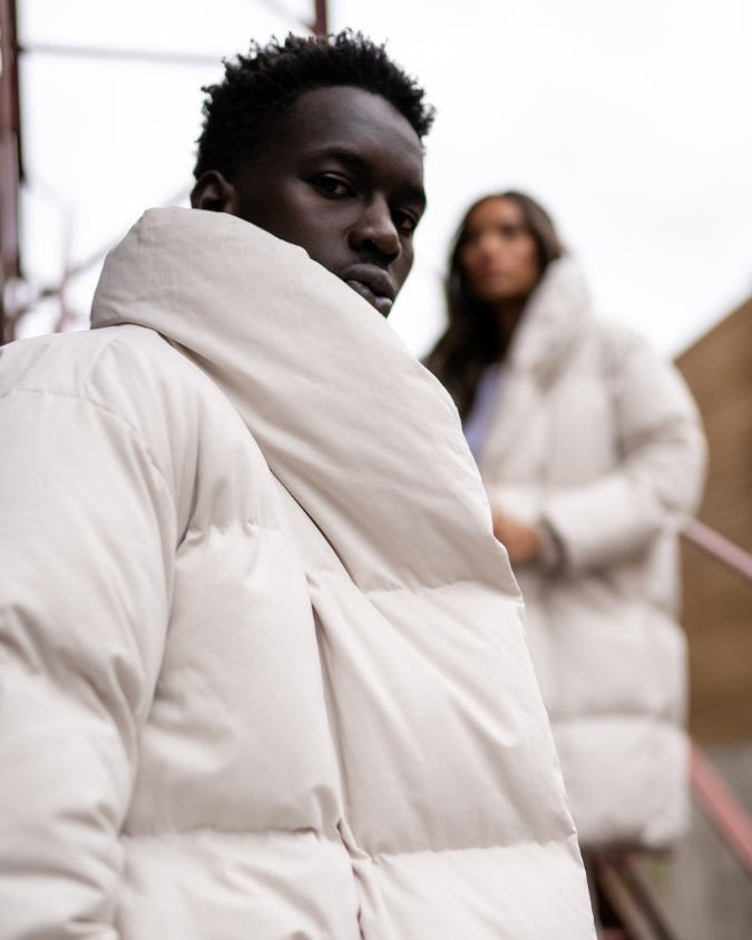 Men and womens stone longline puffer jacket