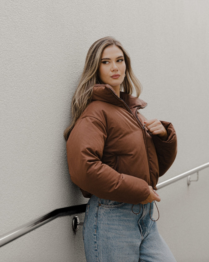 Australian Chocolate cropped puffer jacket worn by female model