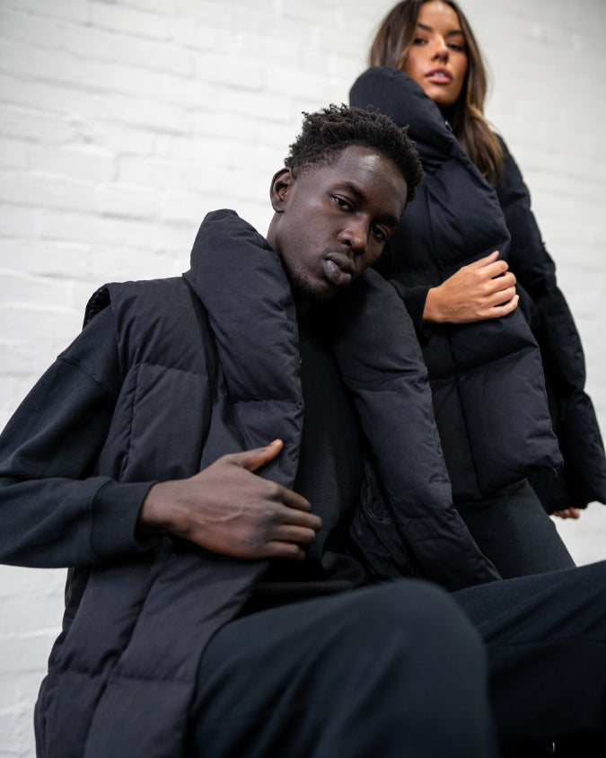 Australian Black Longline Puffer Vest worn by male and female model