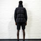 Australian Black Longline Puffer Vest worn by male model full body back view