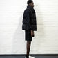 Australian Black Longline Puffer Vest worn by male model full body side view