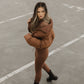 Australian womens Chocolate cropped puffer jacket worn by female model