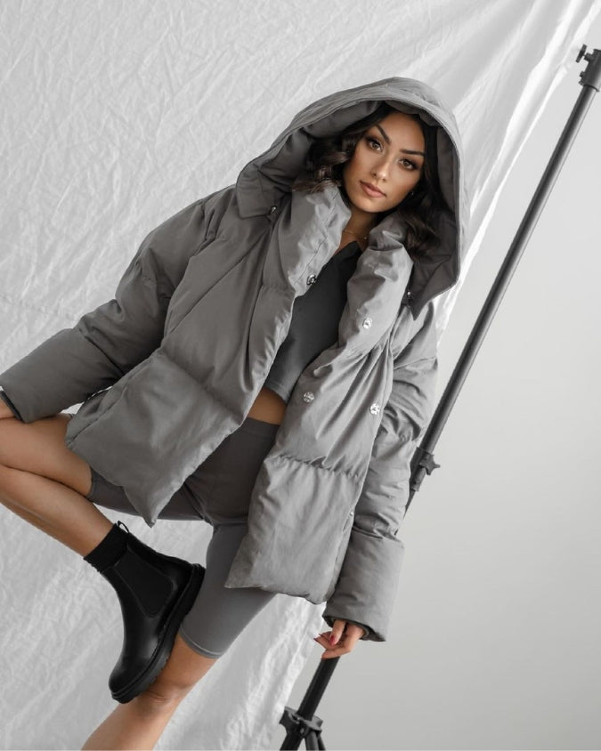 Cleaned Charcoal puffer jacket with oversized fit worn by female model